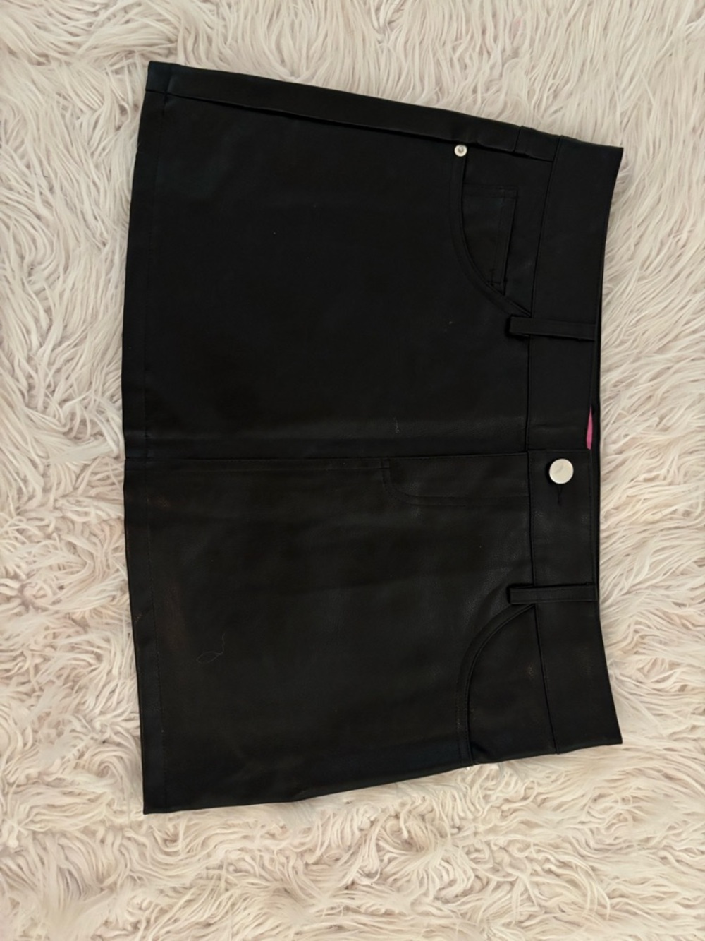 Edikted Black Faux Leather Mini Skirt with Pink Tag Detail